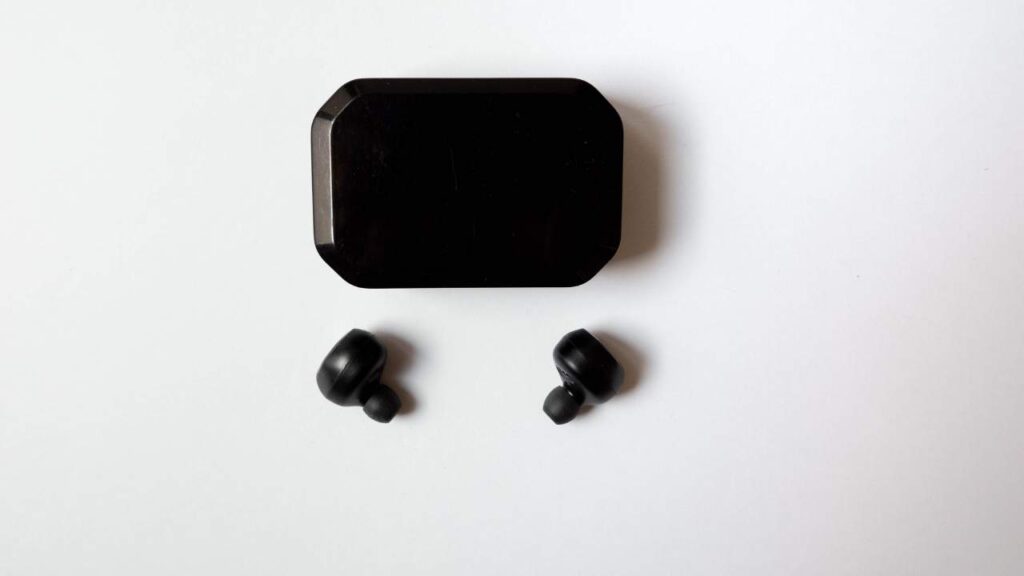 black colored earbuds with square sized case